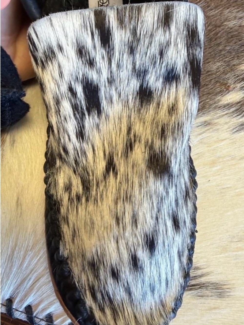 Black and white cowhide fur on Broncy Donkey